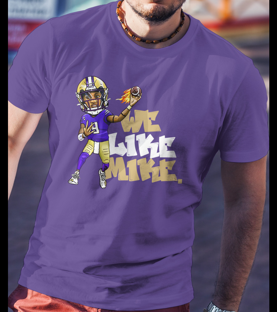 We Like Mike Football Character In Purple And Gold Gear Holding Flaming Ball T-Shirt