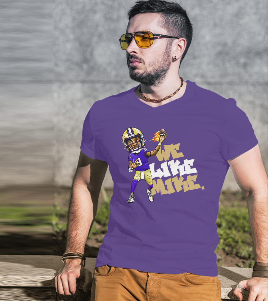We Like Mike Football Character In Purple And Gold Gear Holding Flaming Ball T-Shirt