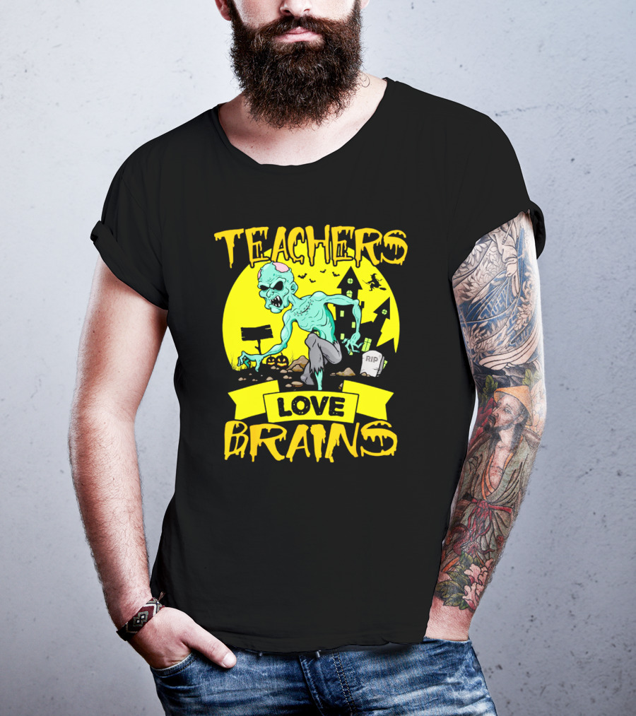 Teachers Love Brains Zombie Halloween Theme With Haunted Houses And Graveyard Background T-Shirt