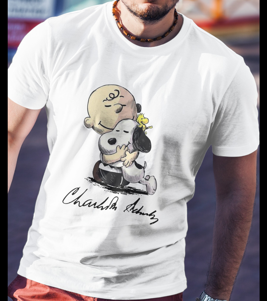 Peanuts Charlie Brown Snoopy Woodstock Hug By Charles Schulz T-Shirt