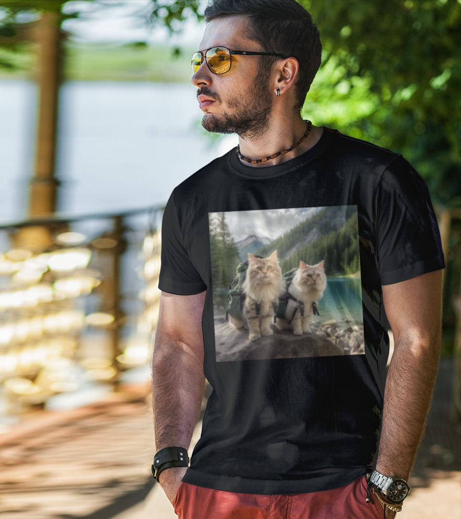 Two American Longhair Cats Are Mountaineering With Backpacks In Scenic Mountain Forest Near Lake T-Shirt