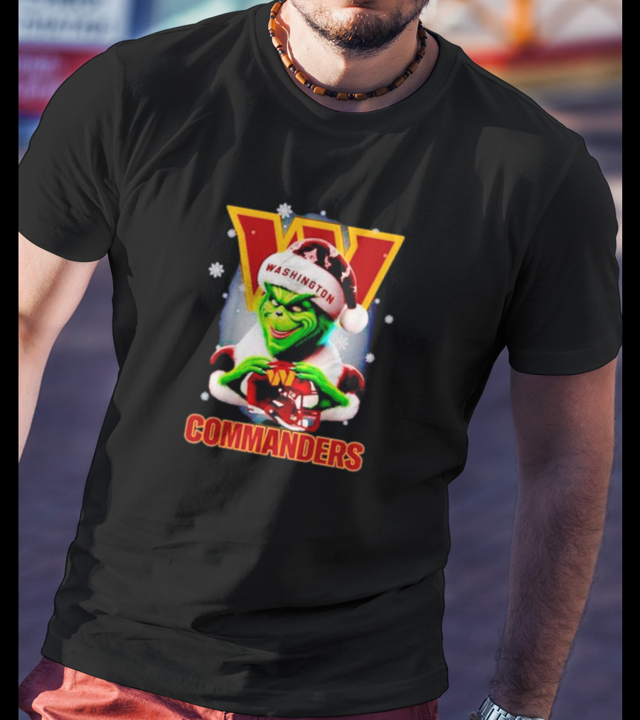 The Grinch Wearing Santa Hat Holding Gift For Washington Commanders Christmas T-Shirt