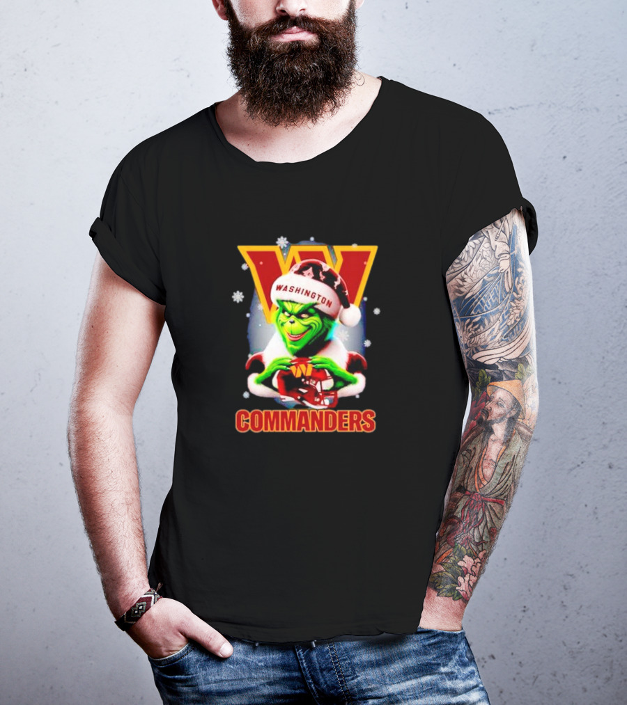 The Grinch Wearing Santa Hat Holding Gift For Washington Commanders Christmas T-Shirt