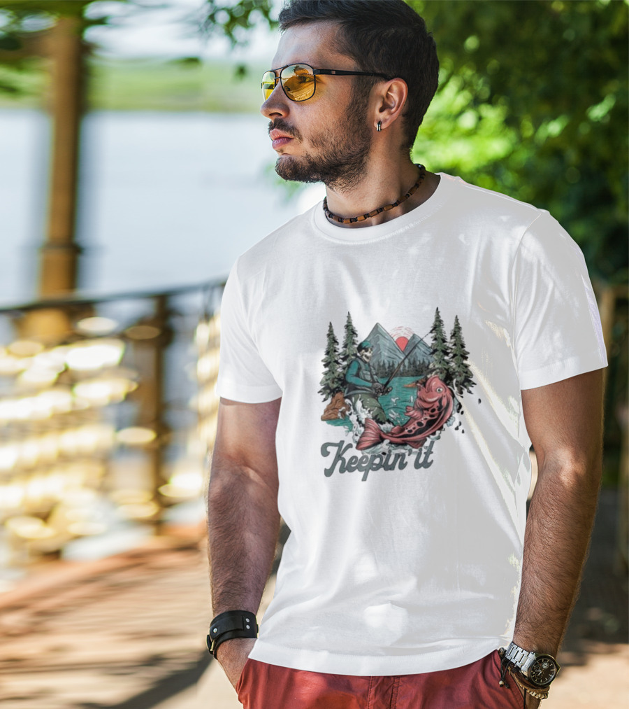 Keepin' It Reel Skeleton Fishing Adventure With Giant Fish And Mountain Lake Scene T-Shirt