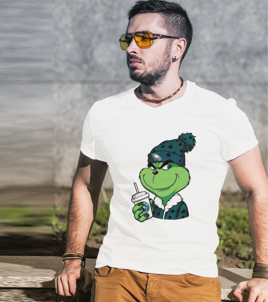 Grinch Holding Cup Wearing Philadelphia Eagles Beanie T-Shirt