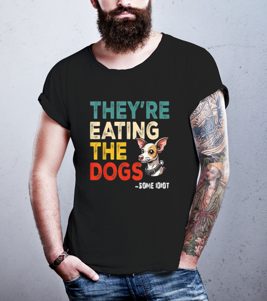THEY’RE EATING THE DOGS - SOME IDIOT T-Shirt