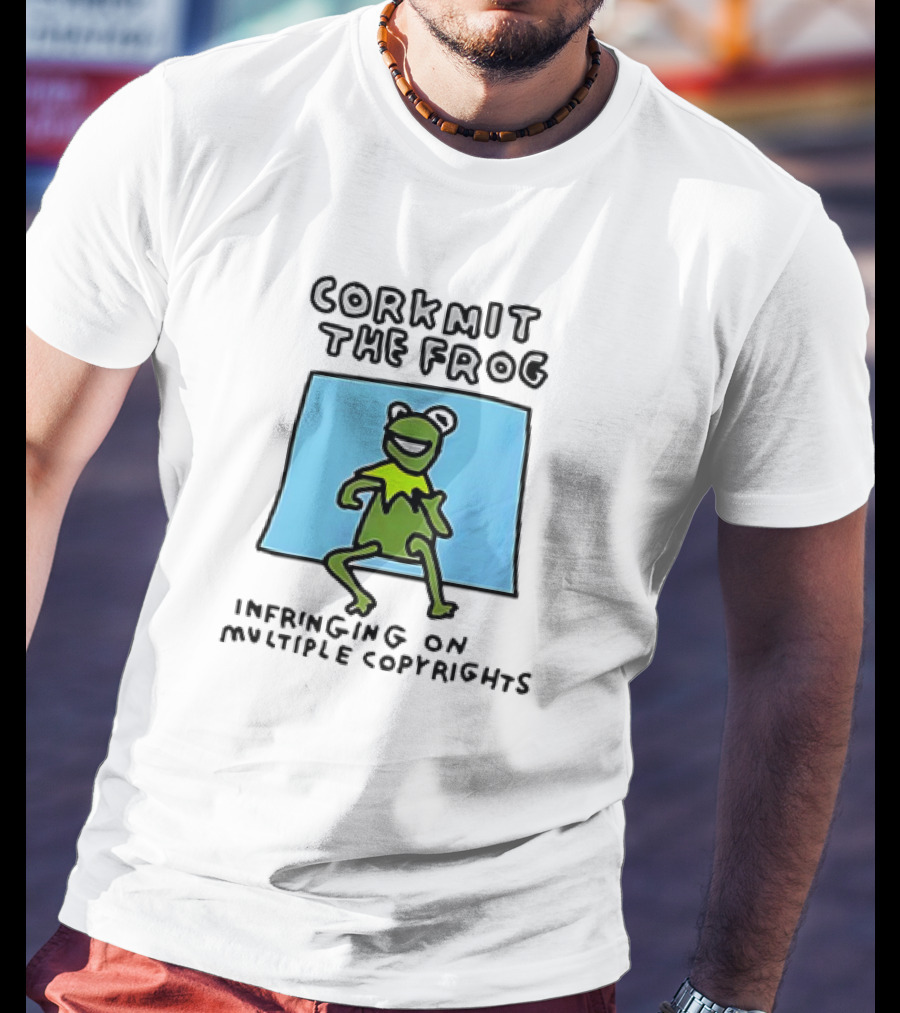 Corkmit The Frog Infringing On Multiple Copyrights Green Frog Cartoon With Blue Background T-Shirt
