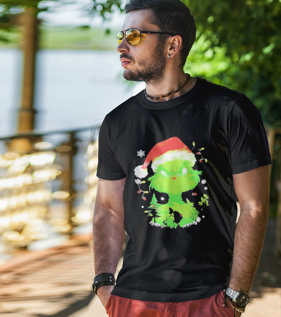 Grinch In Santa Hat Surrounded By Snowflakes And Christmas Lights T-Shirt
