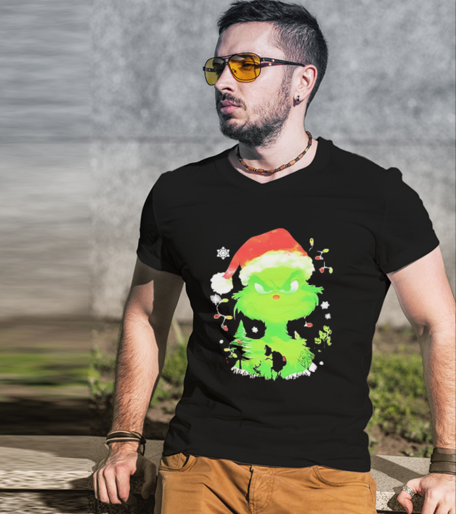 Grinch In Santa Hat Surrounded By Snowflakes And Christmas Lights T-Shirt