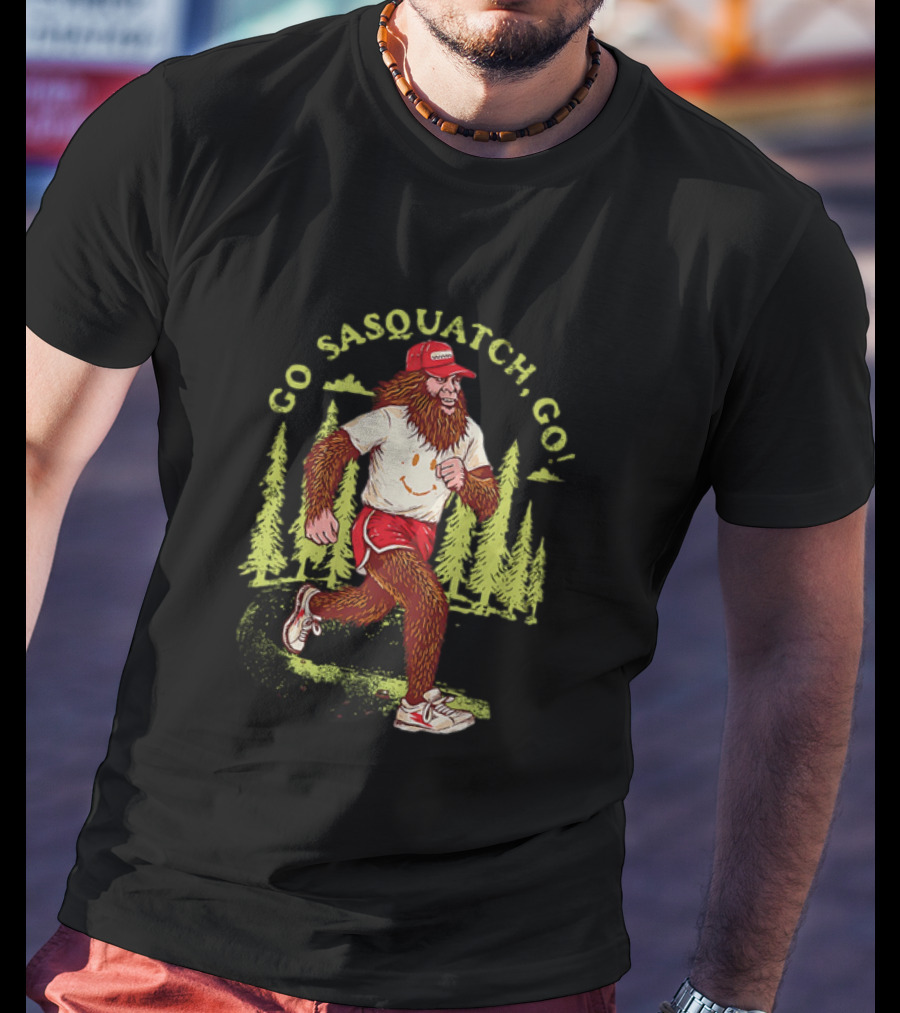 Go Sasquatch Go Bigfoot Jogging In Forest With Red Cap And Sneakers T-Shirt