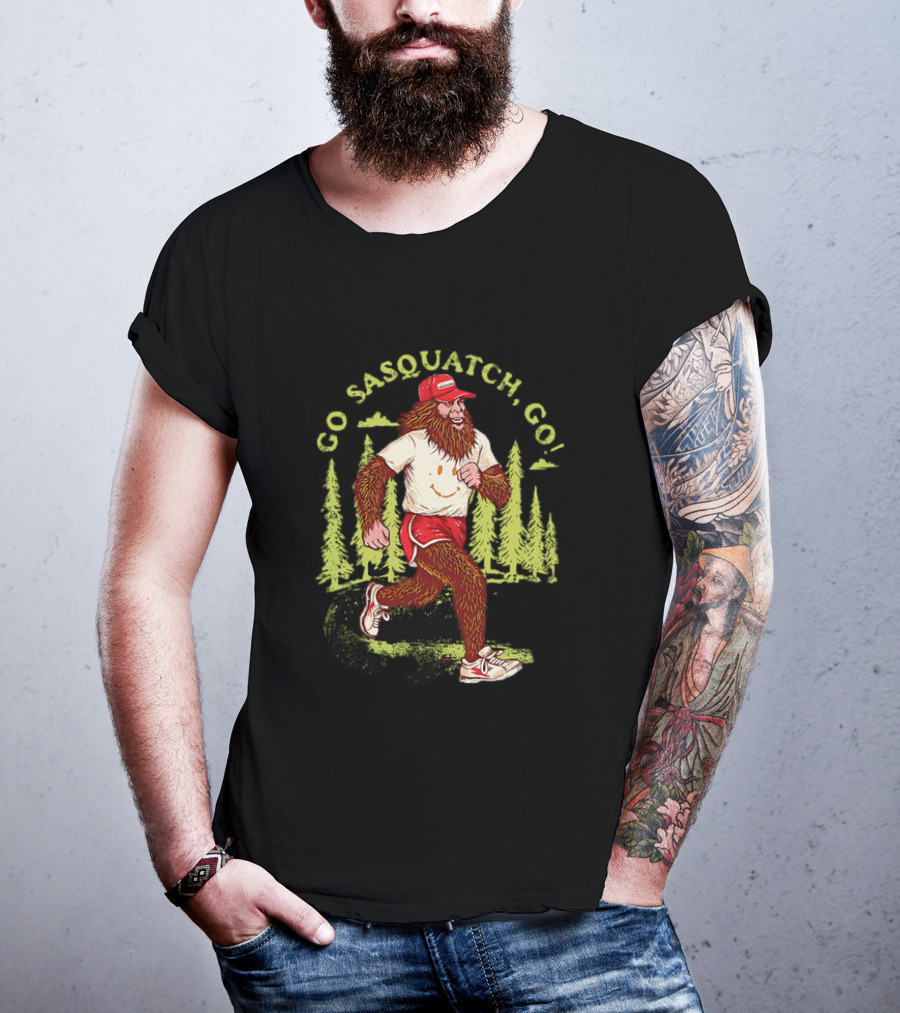 Go Sasquatch Go Bigfoot Jogging In Forest With Red Cap And Sneakers T-Shirt