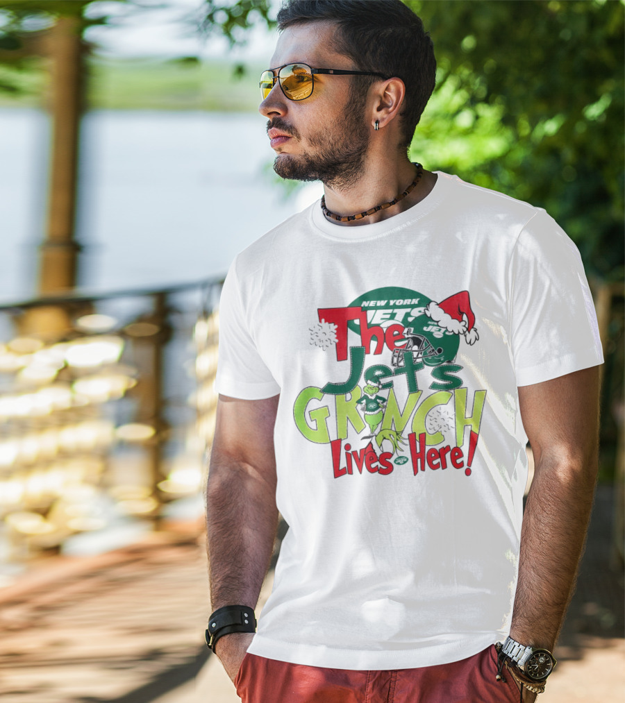 The New York Jets Grinch Lives Here Christmas Festive T-Shirt
