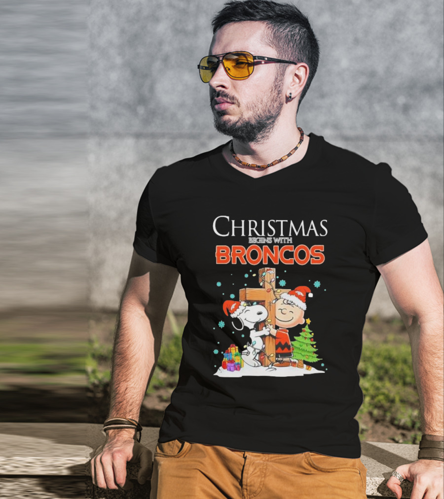 Christmas Begins With Broncos Charlie Brown Snoopy Hug Cross T-Shirt