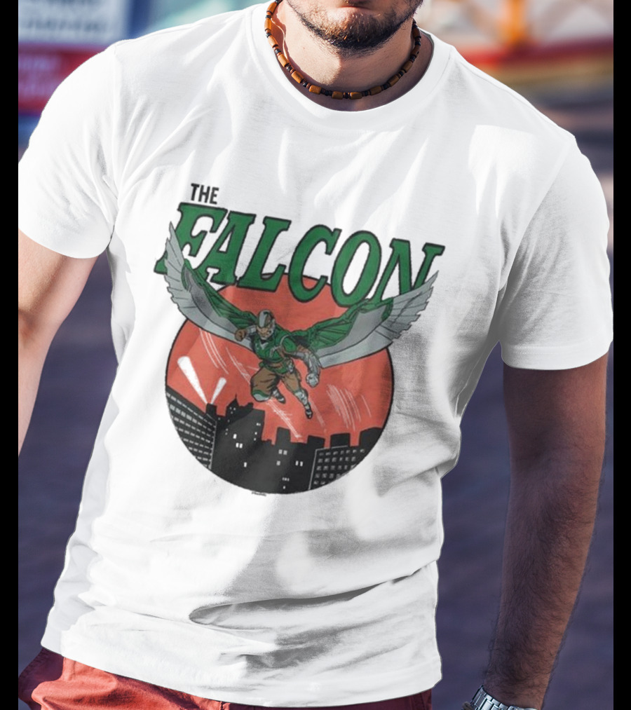 The Falcon Soaring Over City Skyline In Action-Packed Comic T-Shirt