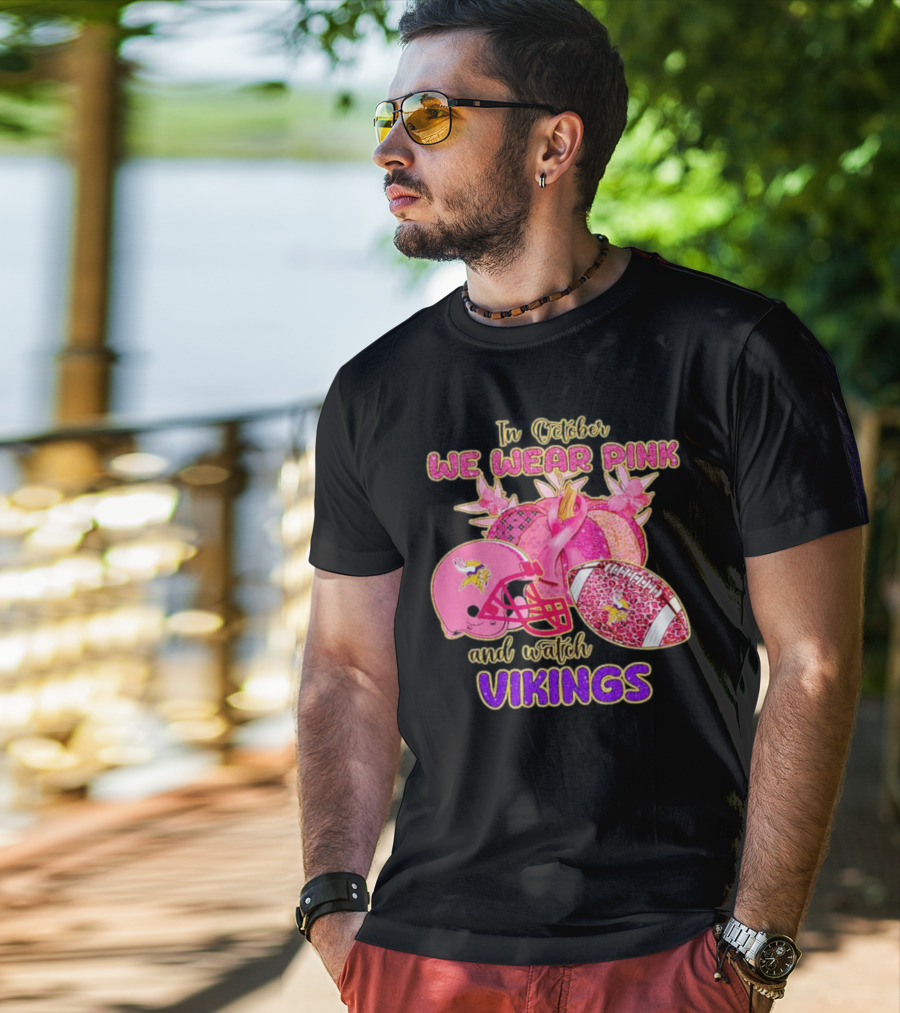 In October We Wear Pink And Watch Vikings Football Helmets Breast Cancer Awareness T-Shirt