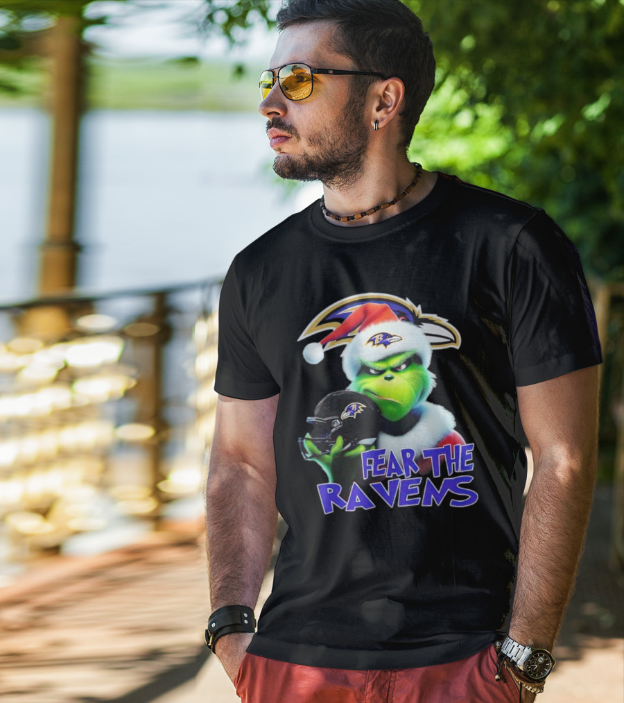 Grinch Wearing Santa Hat Holding Baltimore Ravens Helmet Fear The Ravens T-Shirt