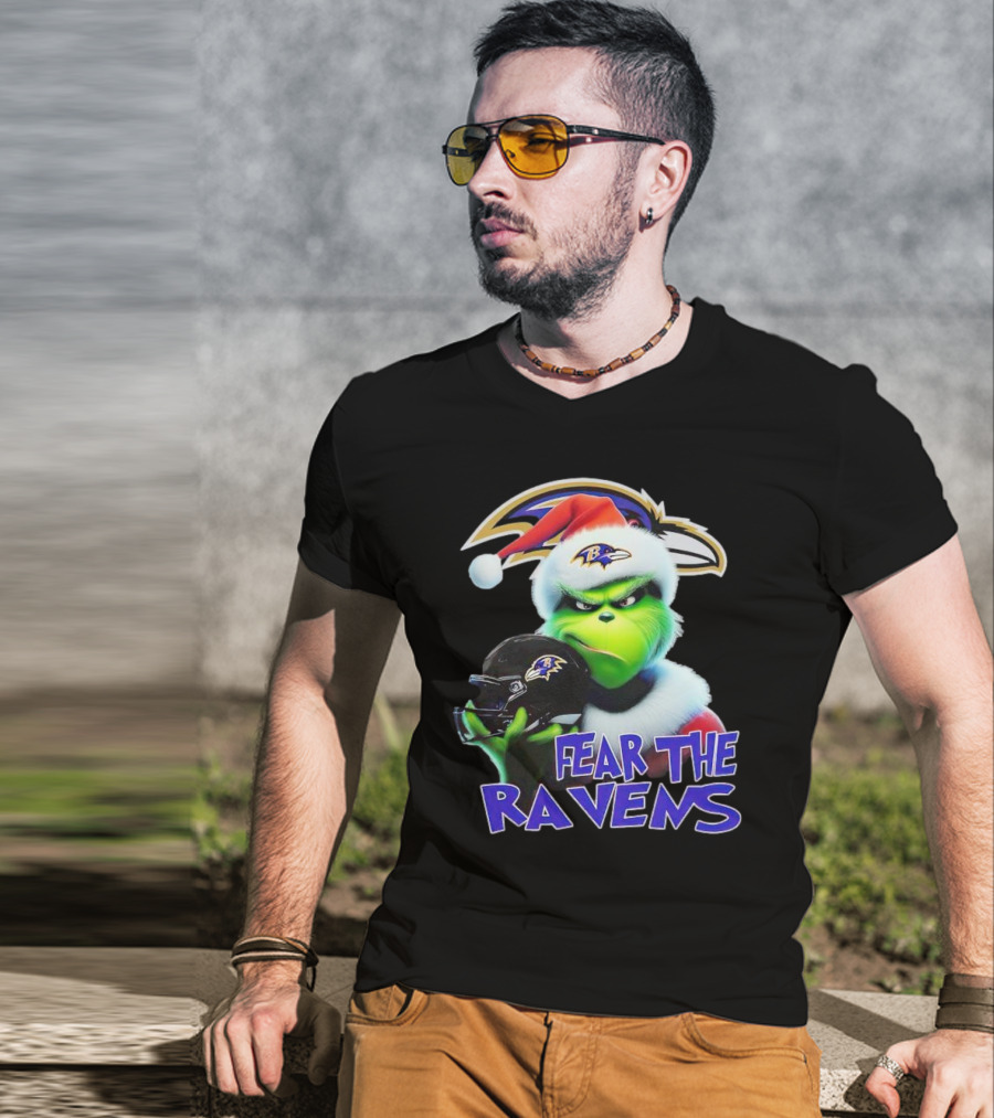 Grinch Wearing Santa Hat Holding Baltimore Ravens Helmet Fear The Ravens T-Shirt