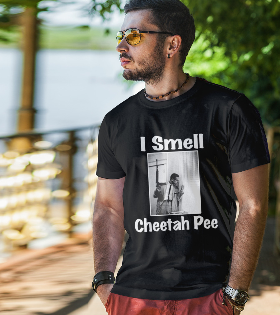 I Smell Cheetah Pee Man Holding Gun By Window T-Shirt