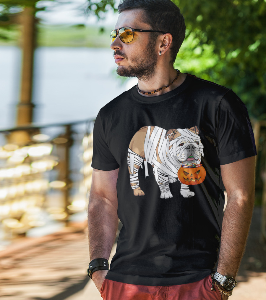 Halloween Bulldog Wrapped As Mummy Holding Pumpkin Candy Bucket T-Shirt