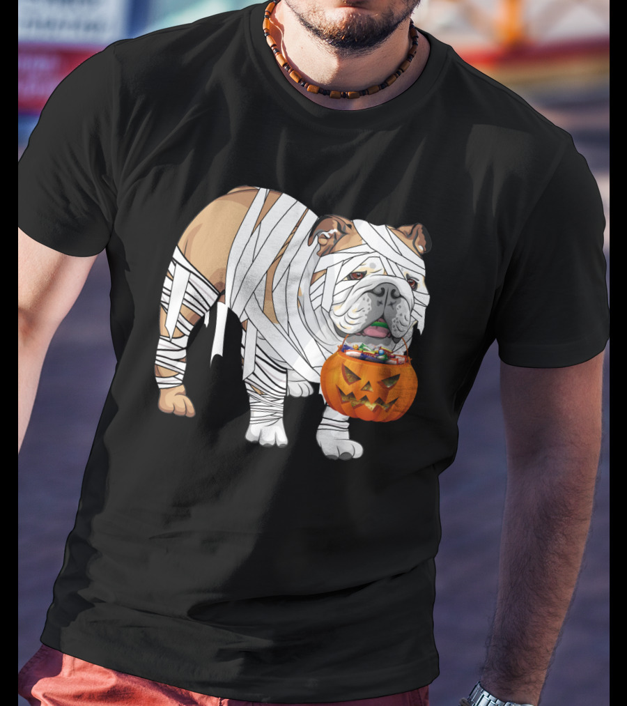 Halloween Bulldog Wrapped As Mummy Holding Pumpkin Candy Bucket T-Shirt