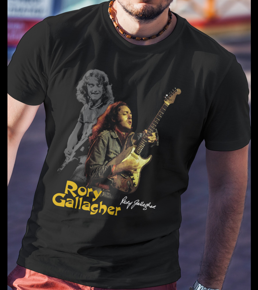 Rory Gallagher Playing Electric Guitar With Signature T-Shirt