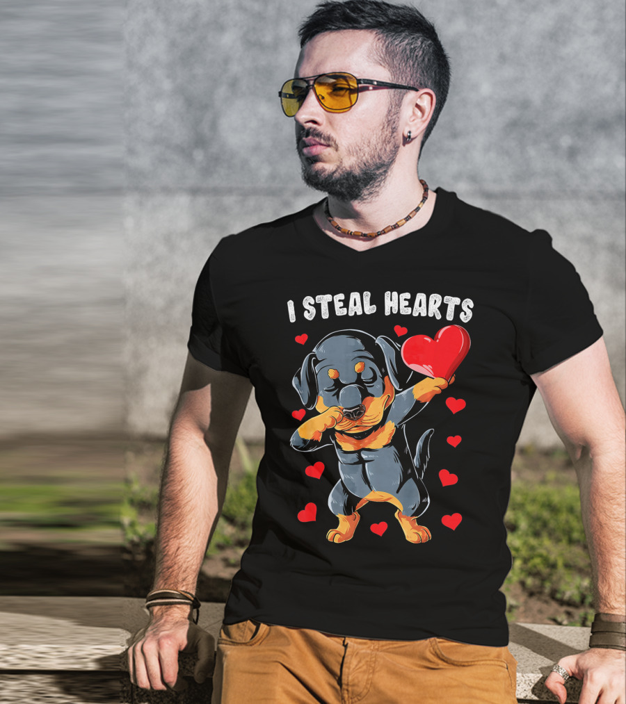 Dabbing Rottweiler Holding Heart Surrounded By I Steal Hearts Text T-Shirt