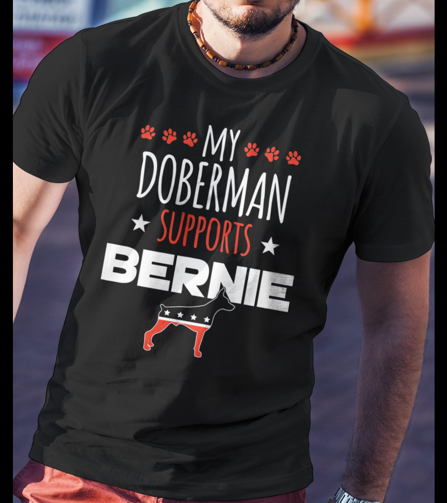 My Doberman Supports Bernie With Red White Blue Stars And Dog Paw Prints T-Shirt