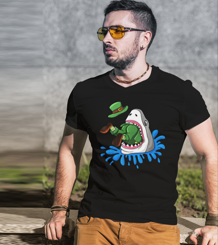 Shark Devours Leprechaun Wearing Green Outfit With Dropped Hat In Water Splash T-Shirt