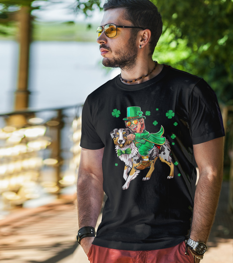 Leprechaun Riding Australian Shepherd With Shamrock Bow Tie And Clover Background T-Shirt