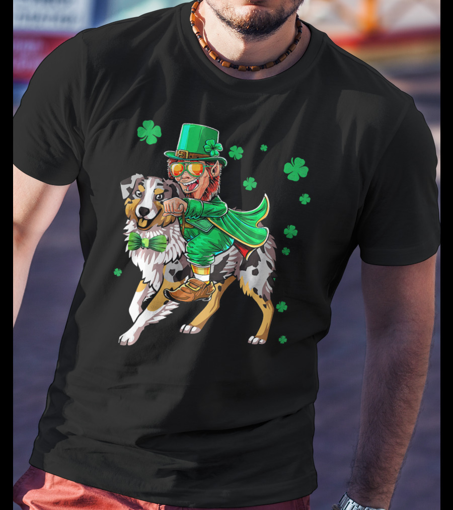 Leprechaun Riding Australian Shepherd With Shamrock Bow Tie And Clover Background T-Shirt
