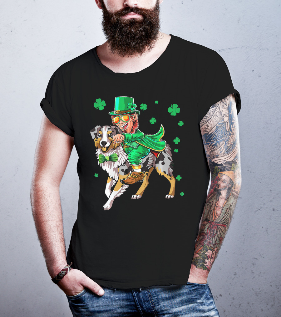 Leprechaun Riding Australian Shepherd With Shamrock Bow Tie And Clover Background T-Shirt