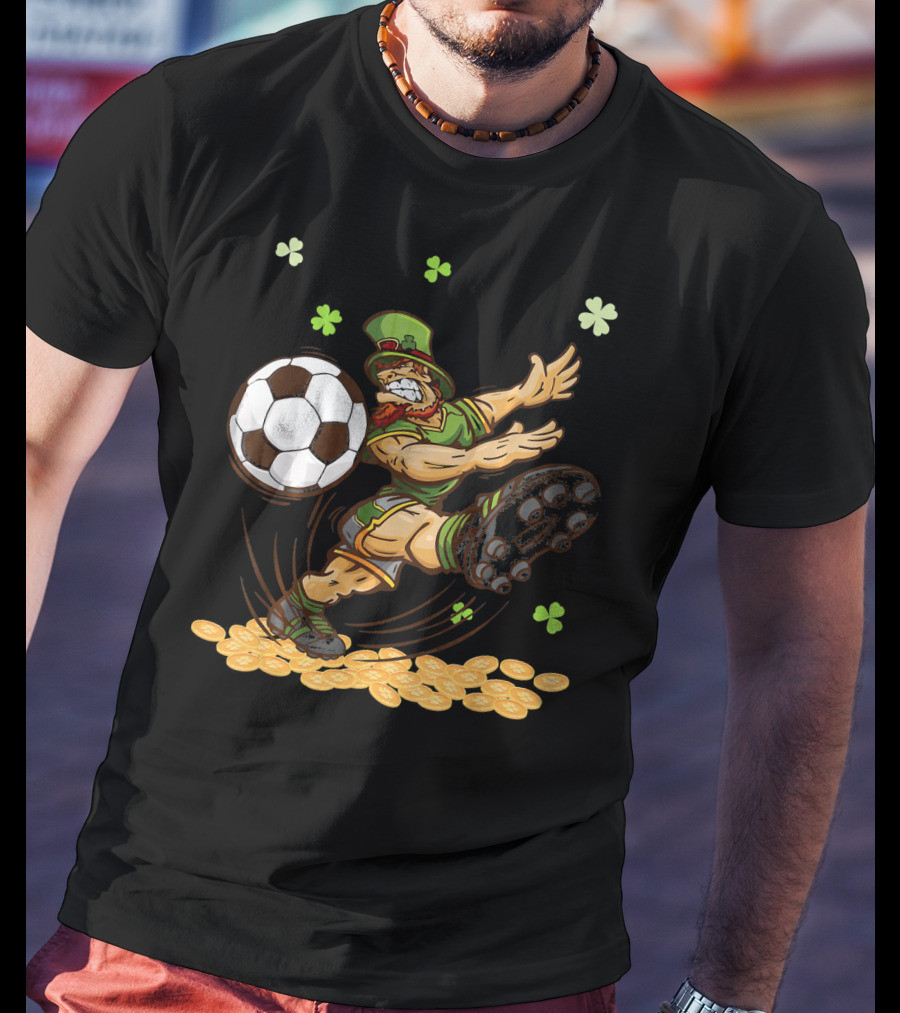 Leprechaun Playing Soccer Surrounded By Shamrocks And Gold Coins T-Shirt