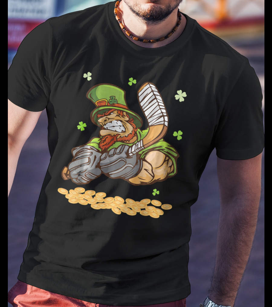 Leprechaun Swinging Hockey Stick Surrounded By Shamrocks And Gold Coins T-Shirt