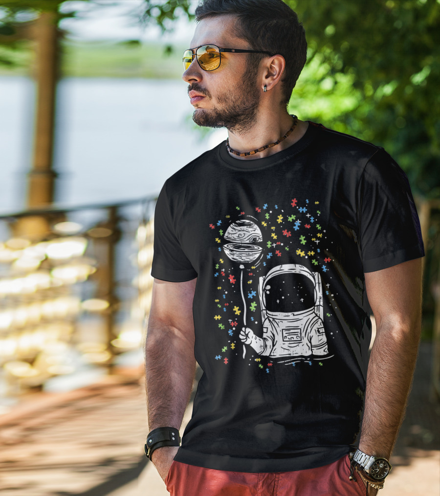 Astronaut Holding Planet Balloon With Puzzle Pieces For Autism Awareness T-Shirt