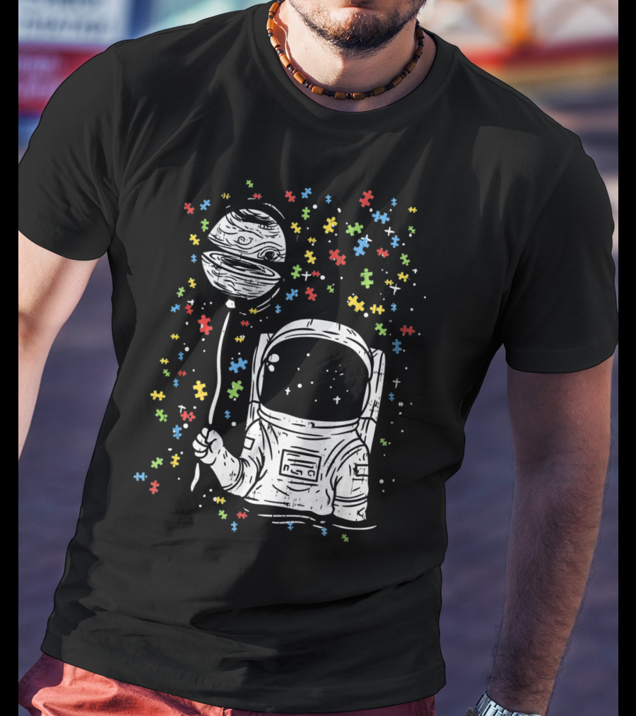Astronaut Holding Planet Balloon With Puzzle Pieces For Autism Awareness T-Shirt
