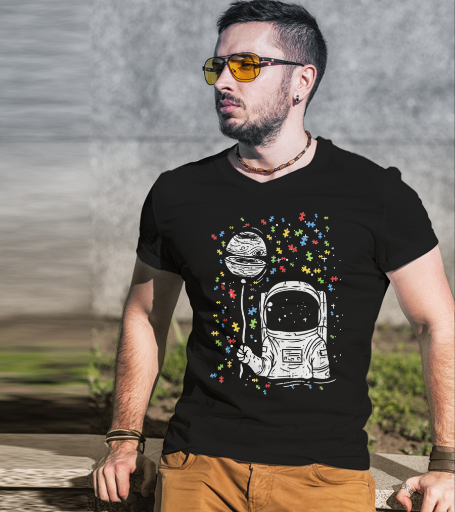 Astronaut Holding Planet Balloon With Puzzle Pieces For Autism Awareness T-Shirt