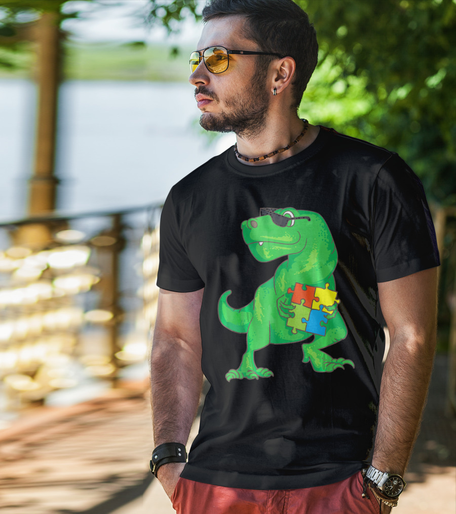 Autism Awareness Month Dinosaur Holding Puzzle Pieces T-Shirt