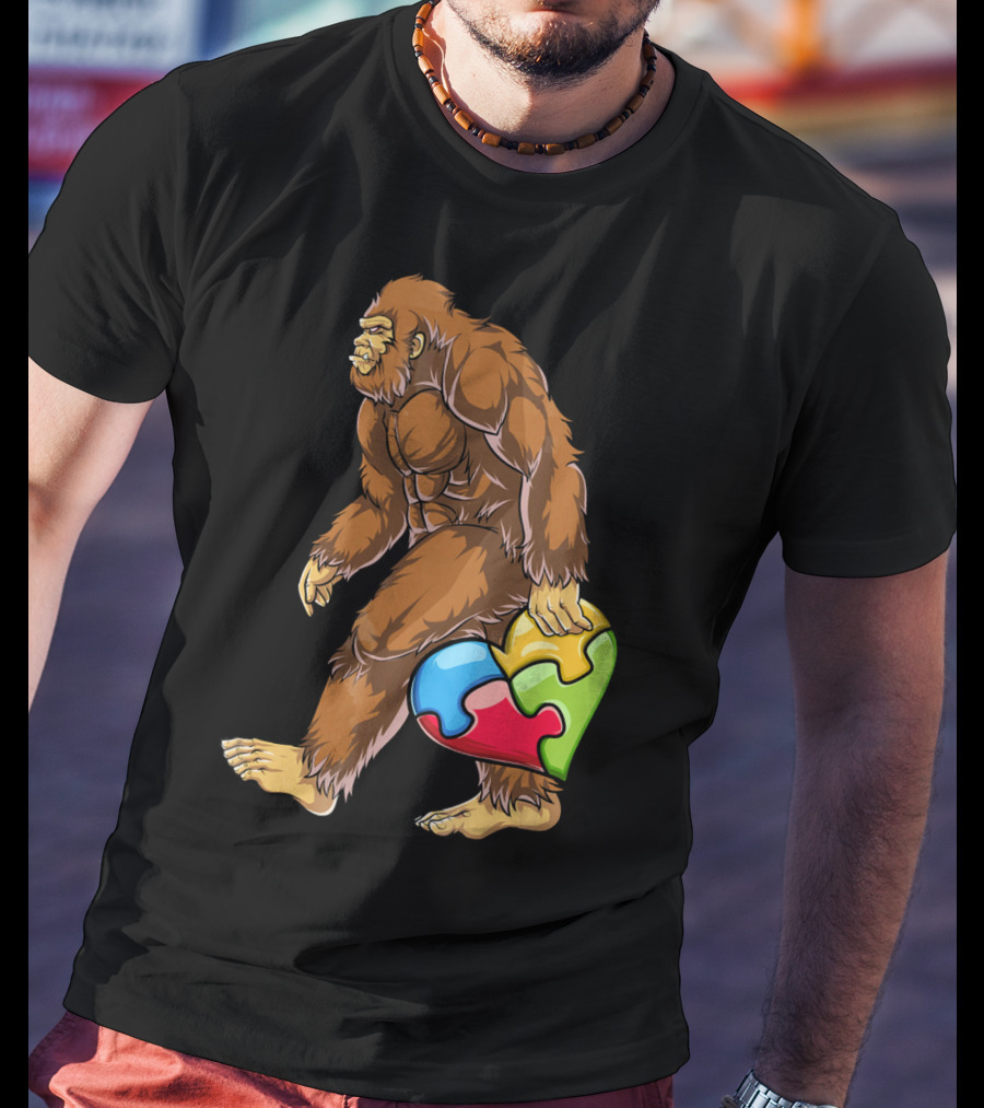 Bigfoot Holding Puzzle Piece Heart Autism Awareness T-Shirt