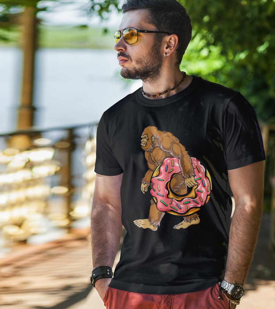 Bigfoot Sasquatch Holding Sprinkled Donut T-Shirt