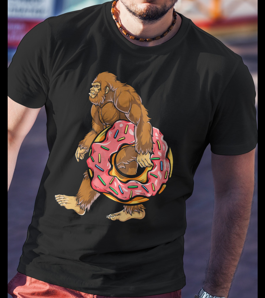 Bigfoot Sasquatch Holding Sprinkled Donut T-Shirt