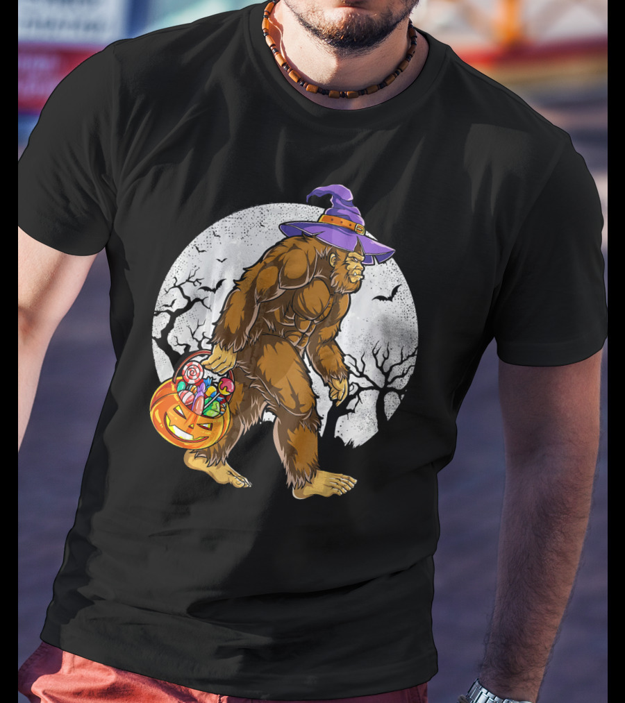 Bigfoot Witch Carrying Pumpkin Candy Basket In Spooky Moonlit Forest T-Shirt