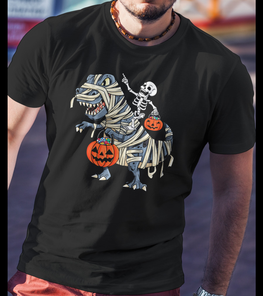 Skeleton Riding Mummy T-Rex With Pumpkin Candy Buckets Halloween Bo T-Shirt