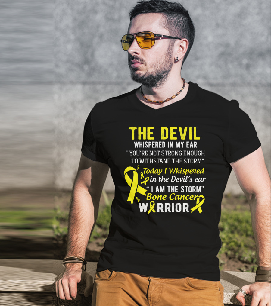 The Devil Whispered You’re Not Strong Enough To Withstand The Storm I Am The Storm Bone Cancer Warrior Yellow T-Shirt