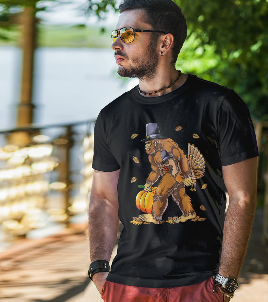 Bigfoot Pilgrim Turkey Carrying Pumpkin Thanksgiving T-Shirt