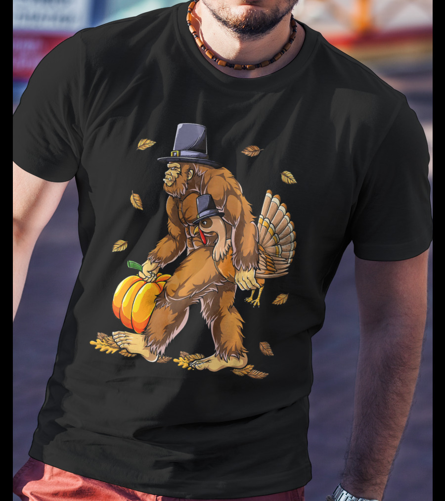 Bigfoot Pilgrim Turkey Carrying Pumpkin Thanksgiving T-Shirt