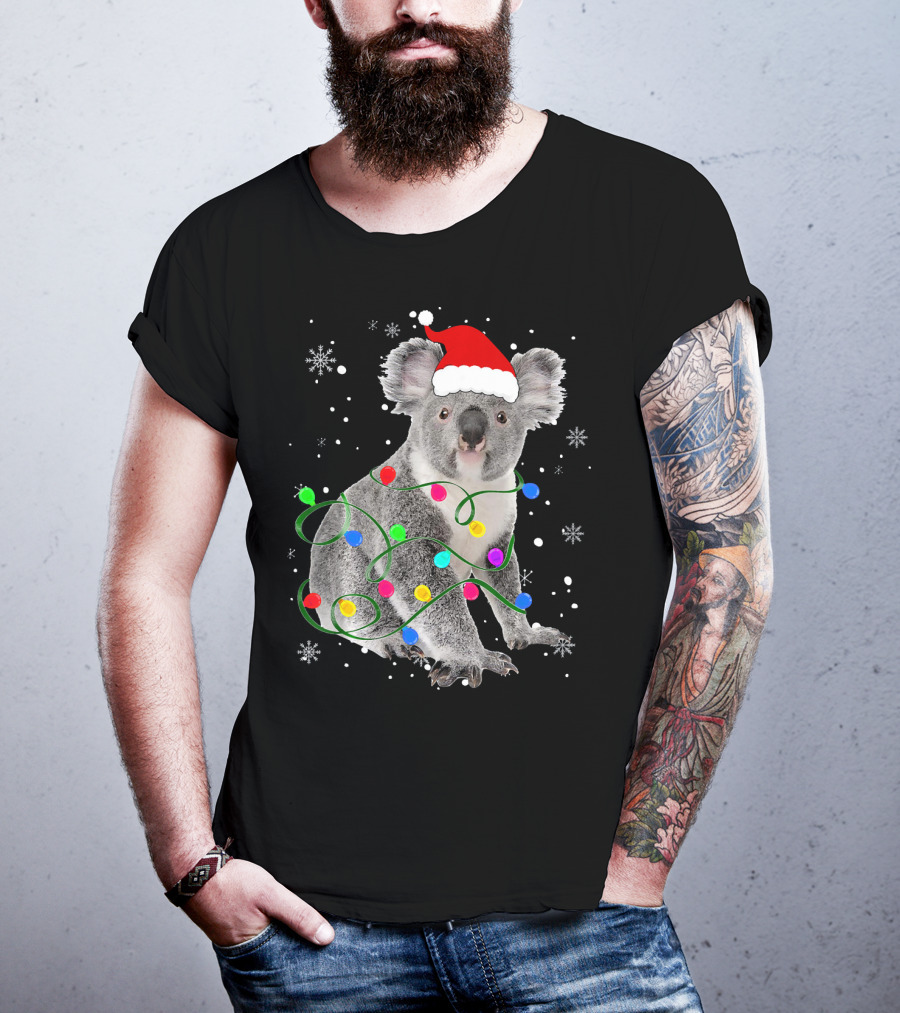 Koala Wrapped In Christmas Lights Wearing Santa Hat With Snowflakes Matching Fam T-Shirt