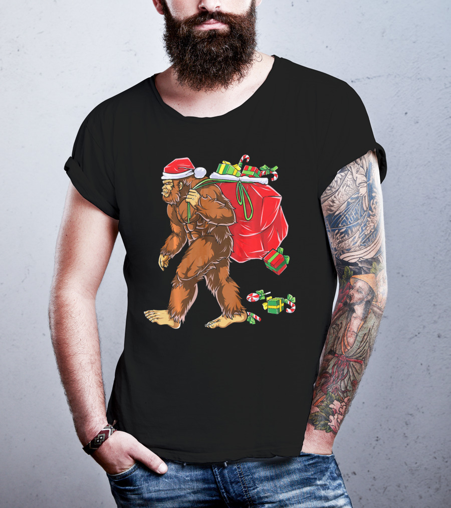 Bigfoot Santa Carrying Gifts With Candy Canes T-Shirt