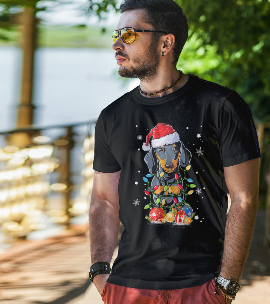Dachshund Wrapped In Christmas Lights With Santa Hat And Ornaments T-Shirt