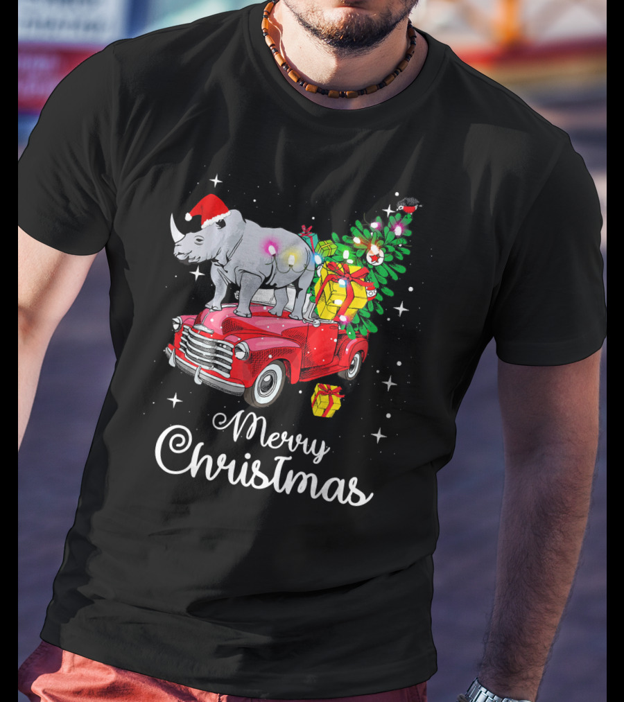 Merry Christmas Rhino Santa Hat On Red Truck With Christmas Tree And Gifts T-Shirt
