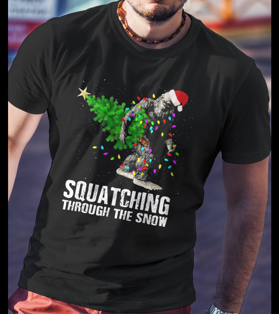 Squatching Through The Snow Bigfoot Christmas Lights Santa Hat T-Shirt